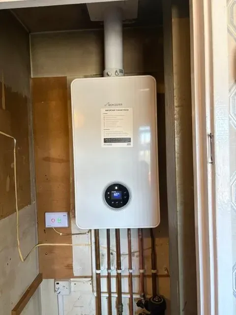 Customer consulting with boiler installation expert in Wolverhampton