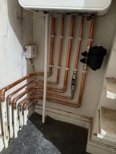 Local technician working on boiler installation in Wolverhampton