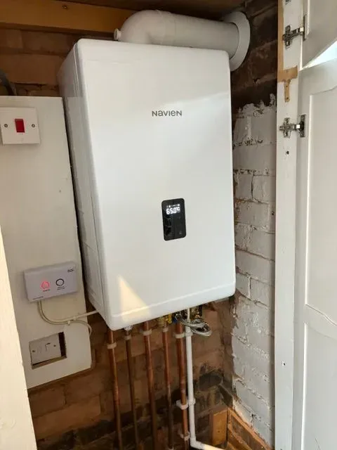 Happy family in warm home after boiler installation in Wolverhampton