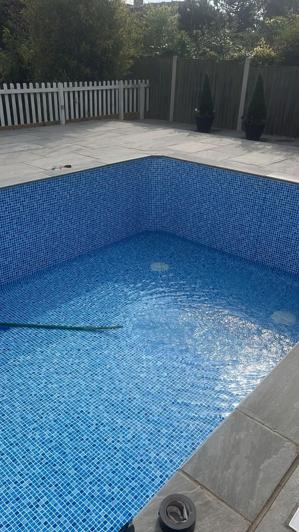 Regular pool cleaning and maintenance image background image