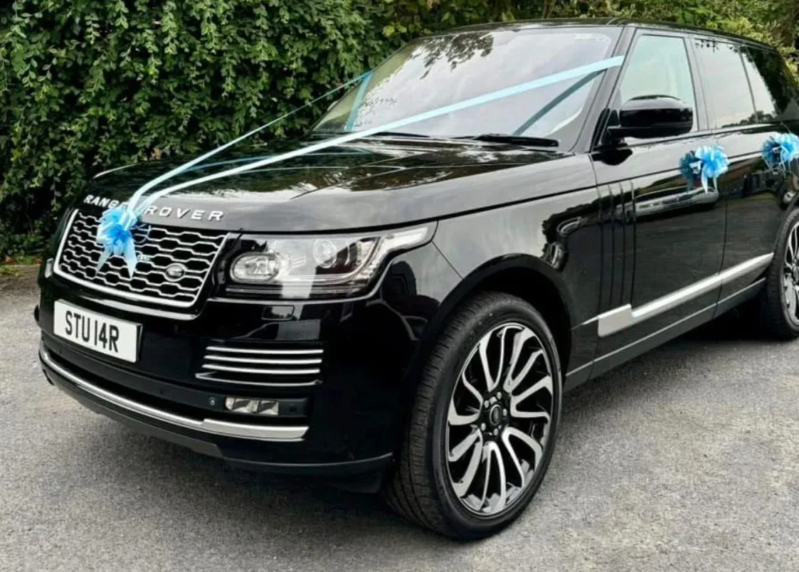 Chauffeur-driven wedding car service image