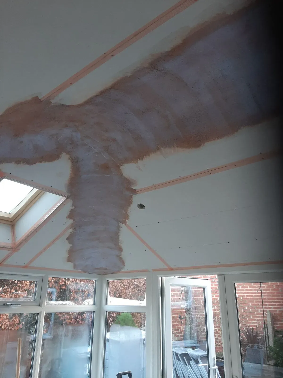 Client consultation about damp issues in Long Bennington