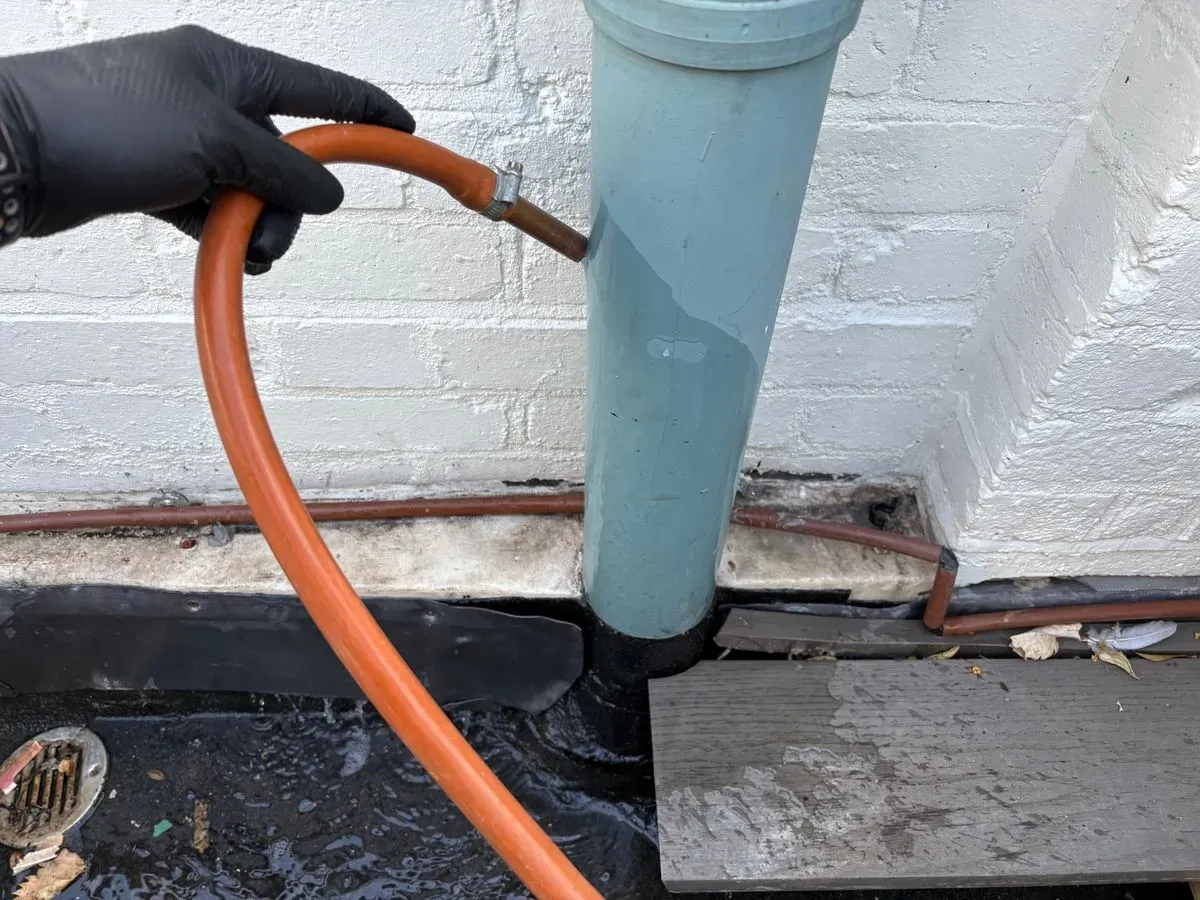 Completion of flat roof leak detection service in Fleet