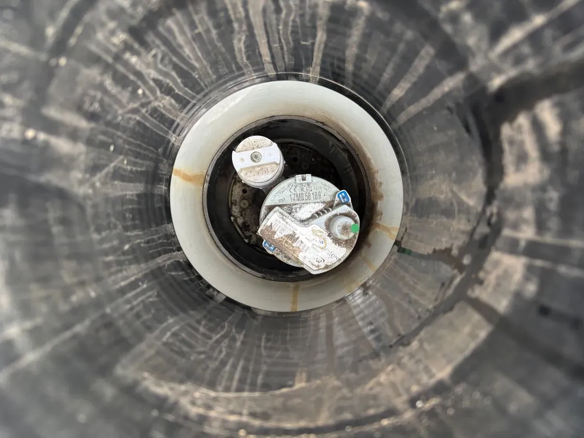 Before and after images of a leak repair in Guildford