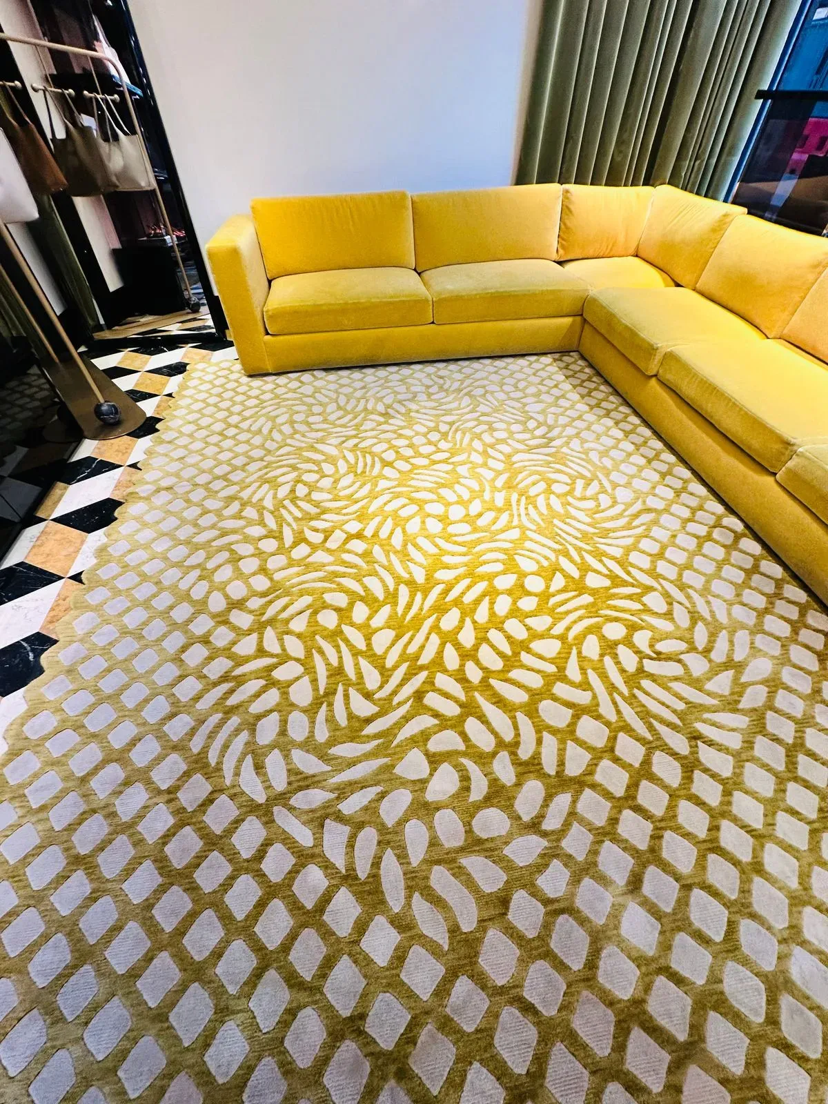 Professional carpet cleaners inspecting carpets in Mayfair