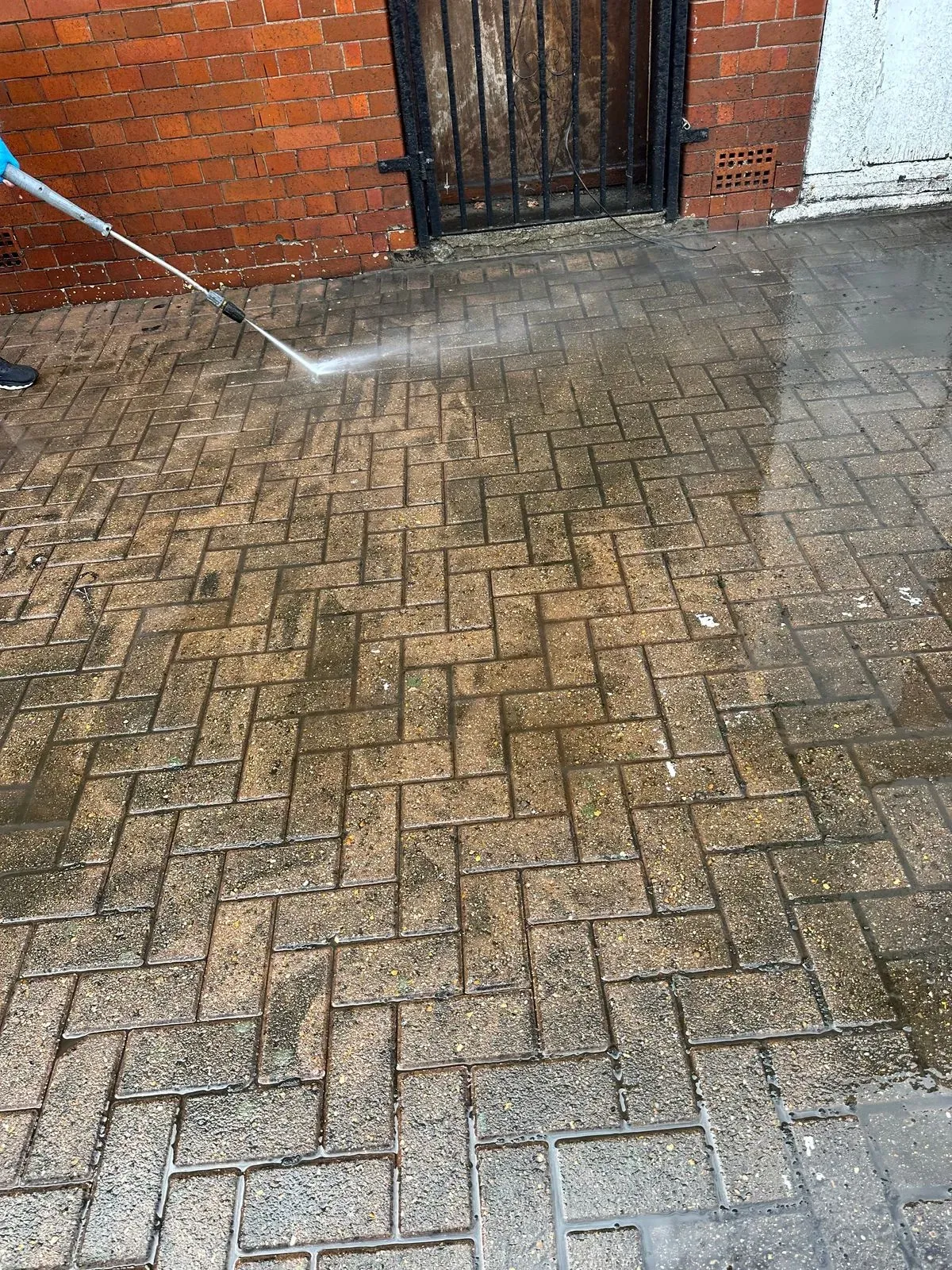 Jet washing stone patio in Mayfair
