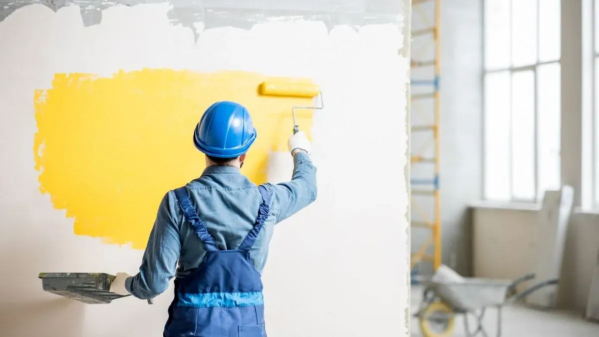 Local painter preparing surfaces for painting in Stanmore