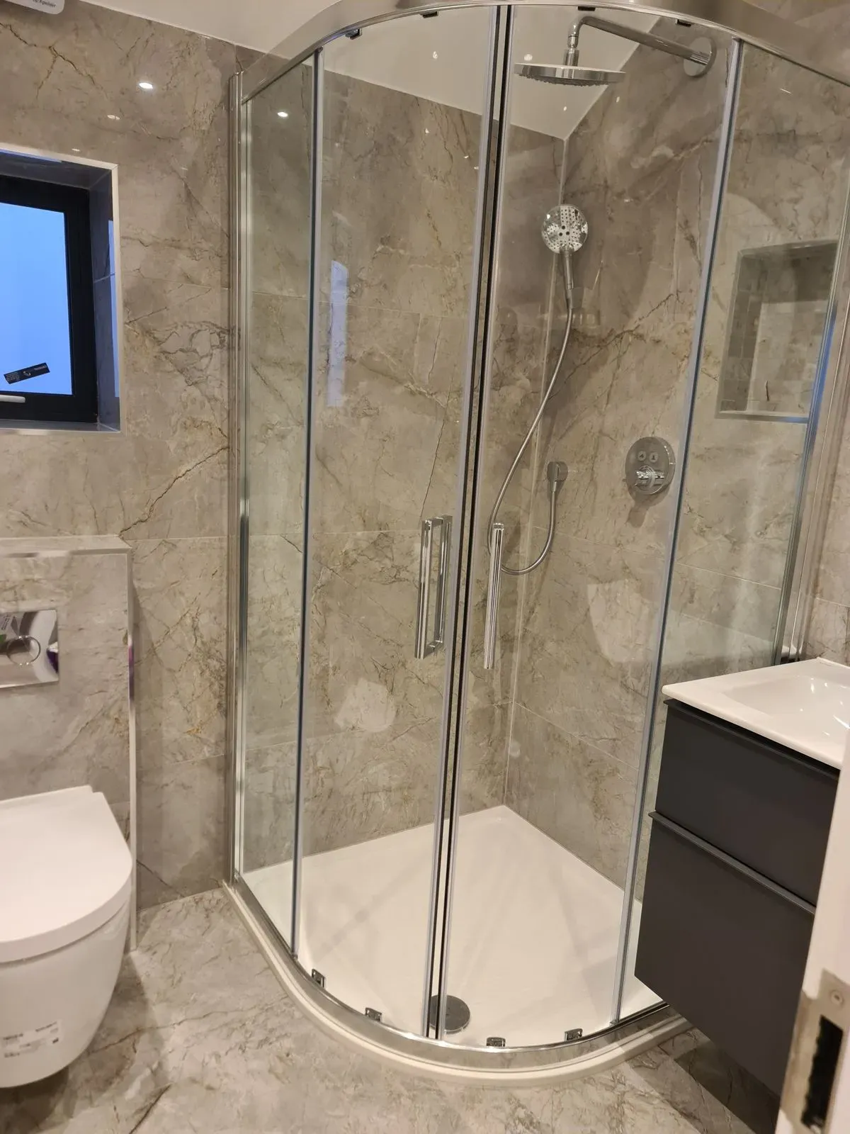 Professional plumber fixing a pipe in Harrow