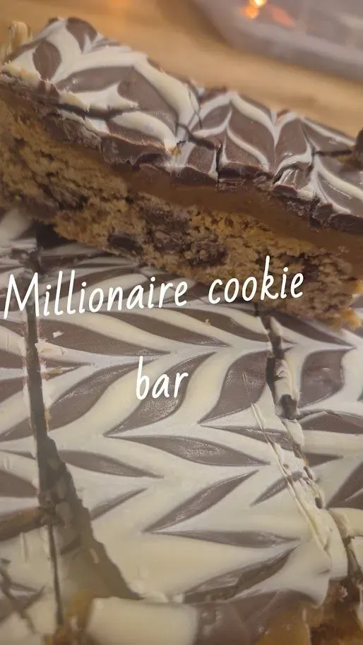 8228307557384-m896515tbkgi3m2ghbz0jq-millionaire-cookie-bar thumbnail image
