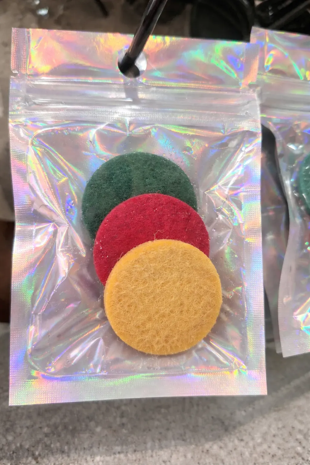 8223914423531-t95korjwdqo440cu3jse26-Vibrant-hoover-discs-in-holographic-pouch thumbnail image