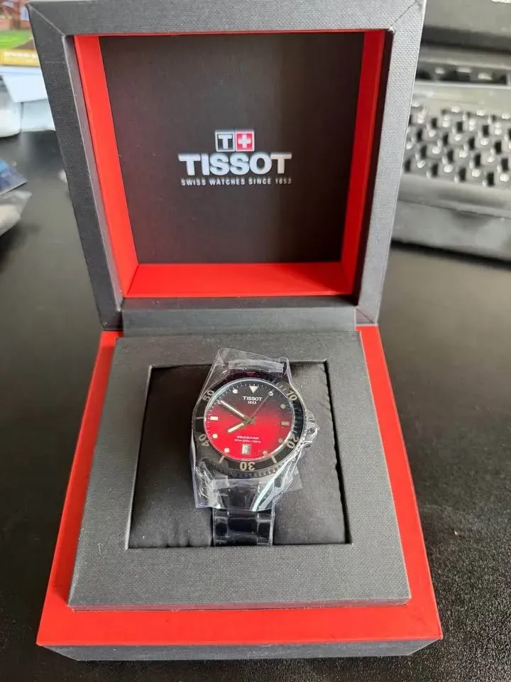 8213649754438-iawhrovosq9umby08mfp4s-Tissot-Seastar-1000-Red collection background image