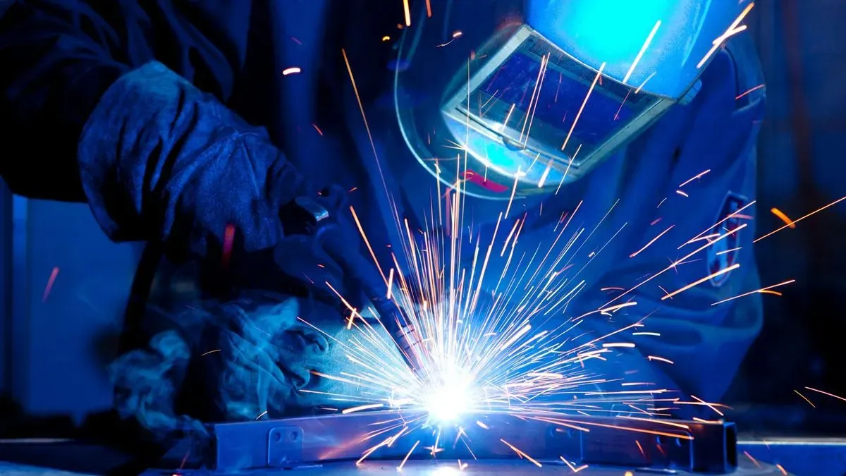 Local technician performing arc welding in Welwyn