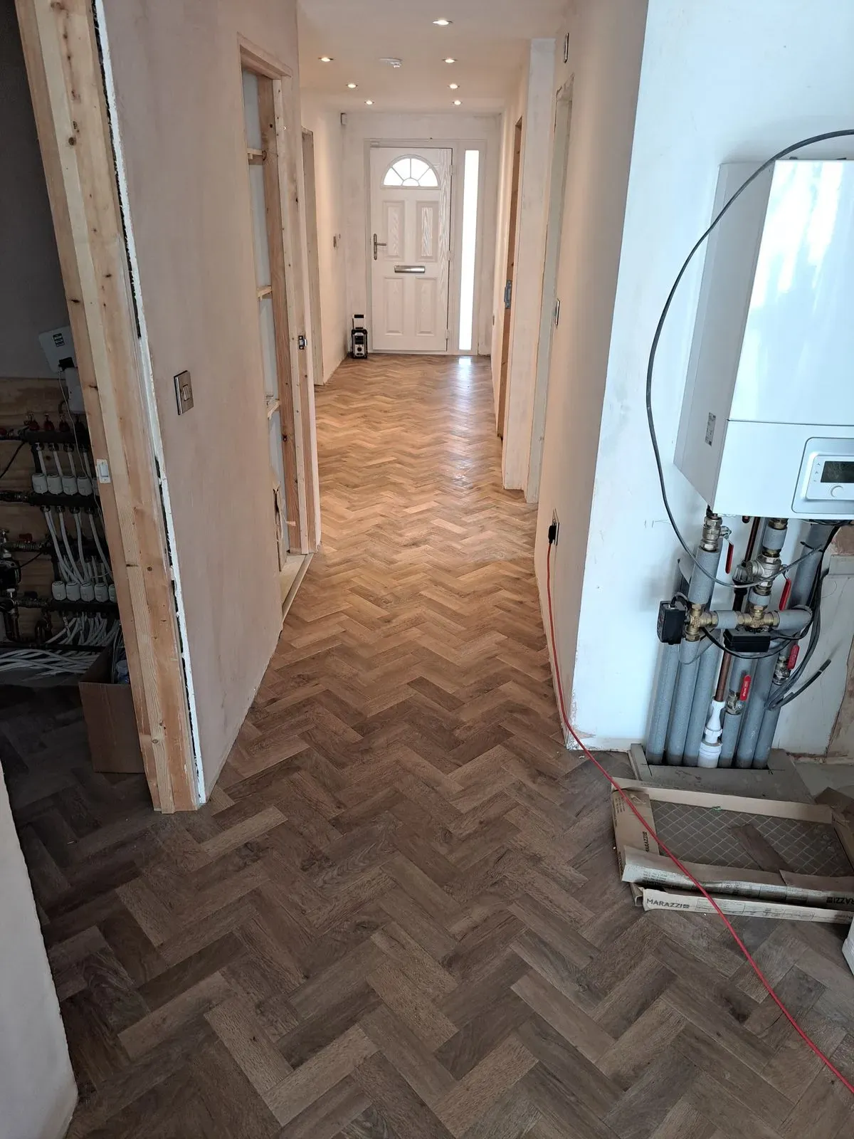 Luv Floors team measuring for vinyl flooring in Cosham