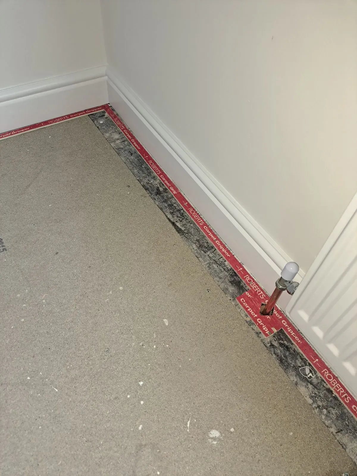 Luxury vinyl tiles being installed in a Fareham home