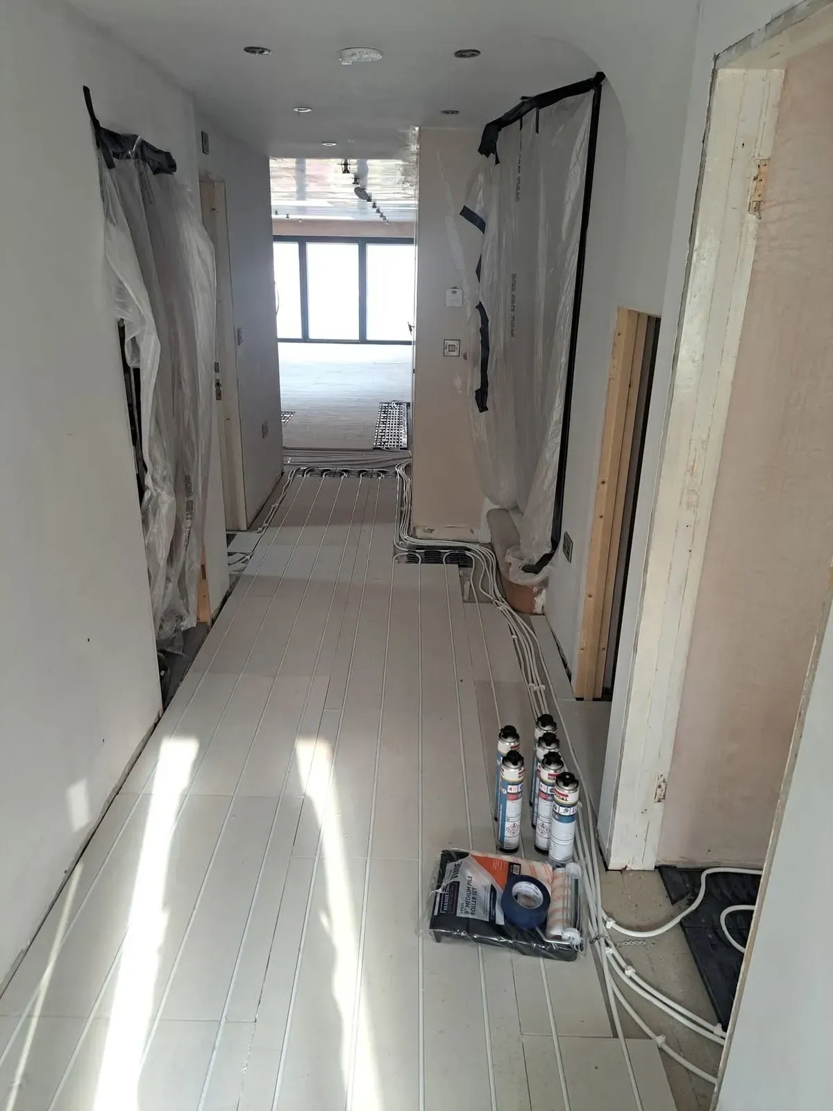 Team at Luv Floors working on LVT installation in Fareham