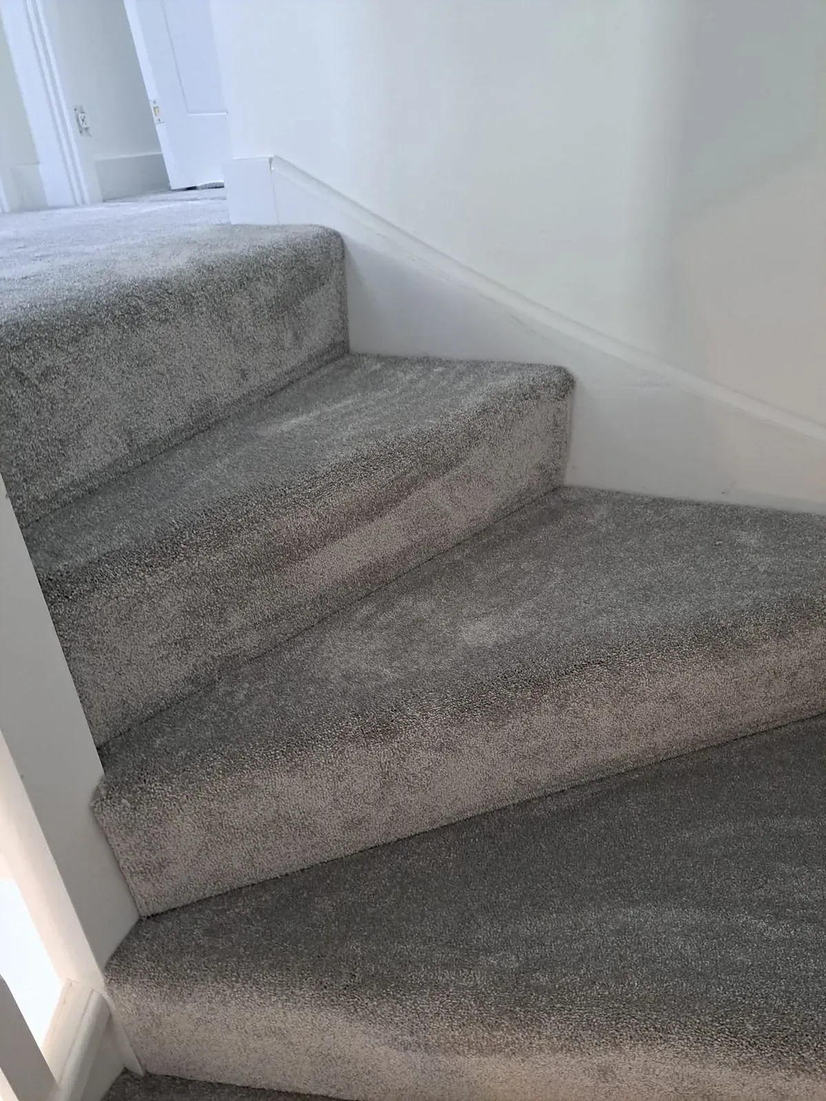 Luv Floors installer measuring carpet for perfect fit in Fareham