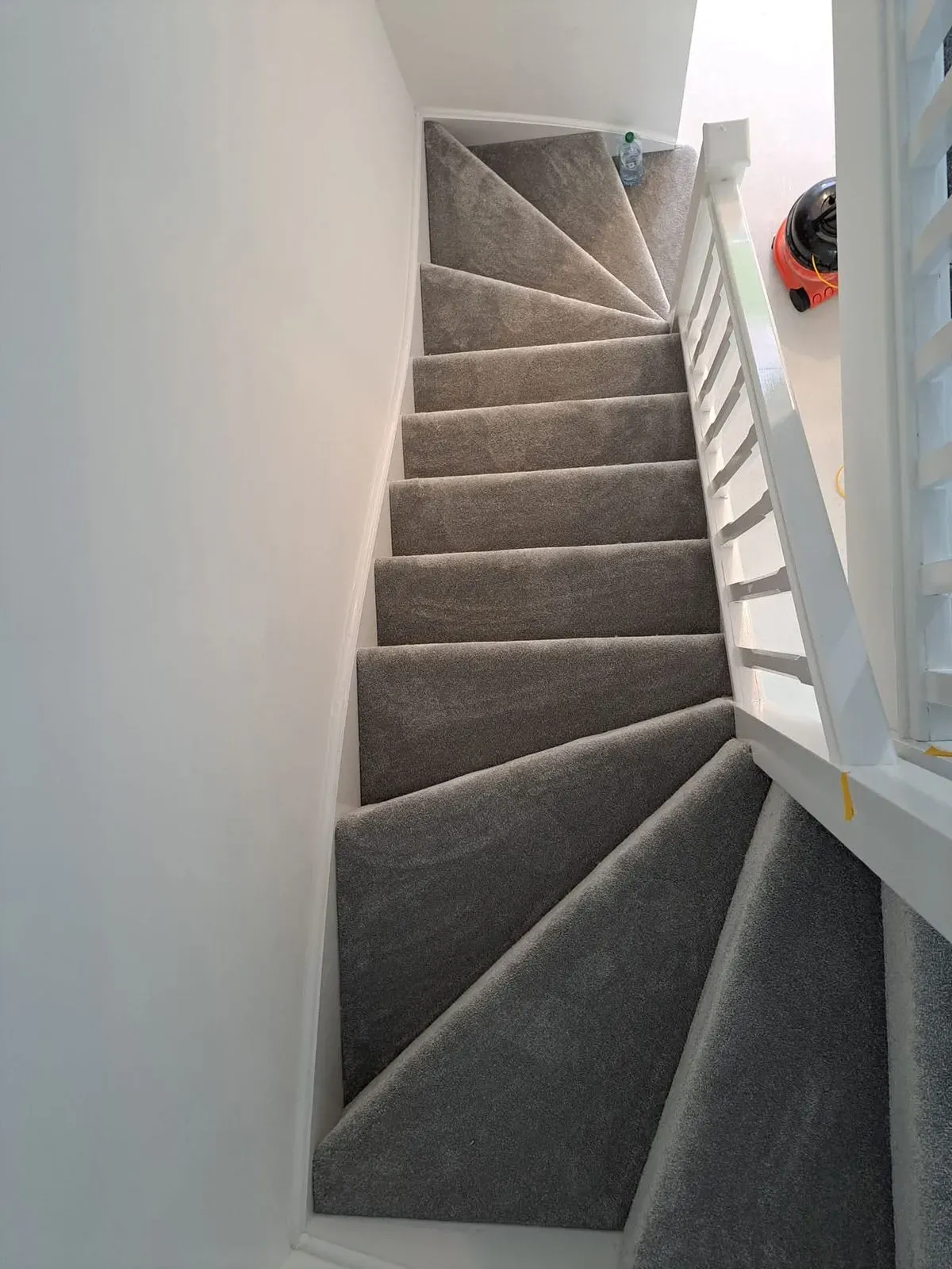Cosham carpet fitting team measuring a room