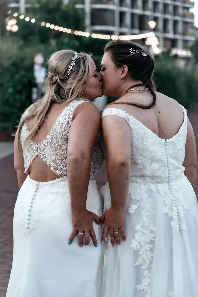 Two brides sharing a romantic kiss at The View Hotel Eastbourne
