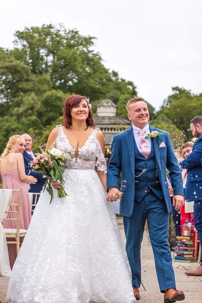 Bride and groom celebrating at Albert Cottage Hotel, Isle of Wight