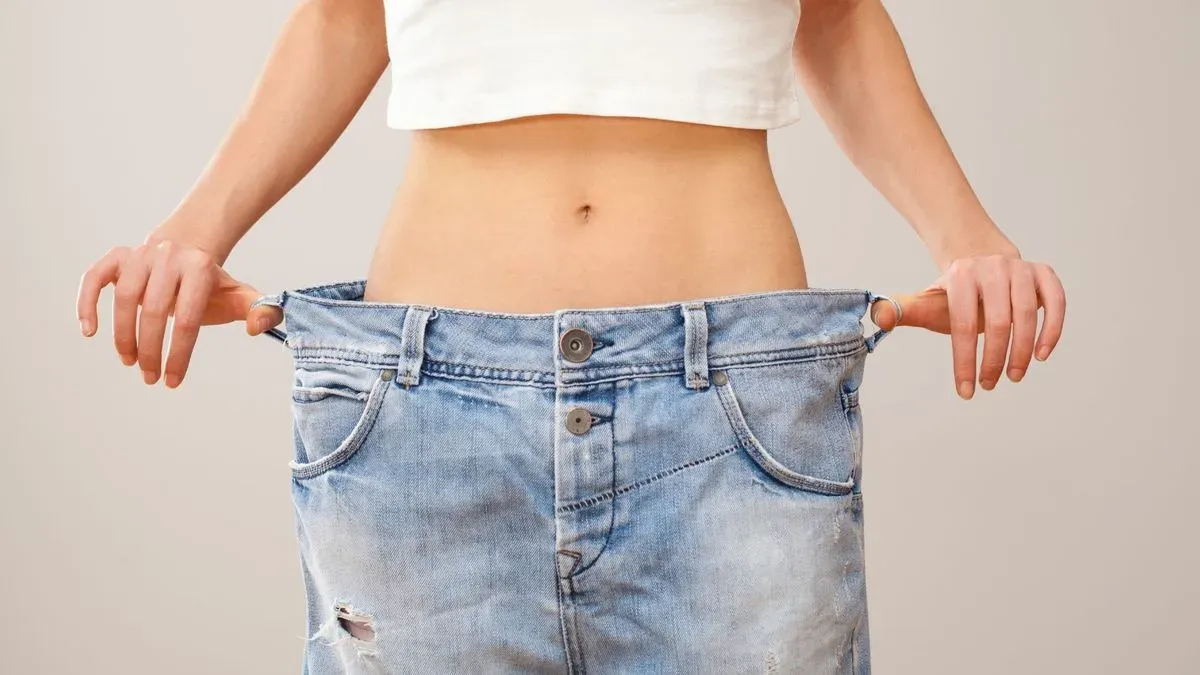 Professional administering weight loss jab in Leeds clinic