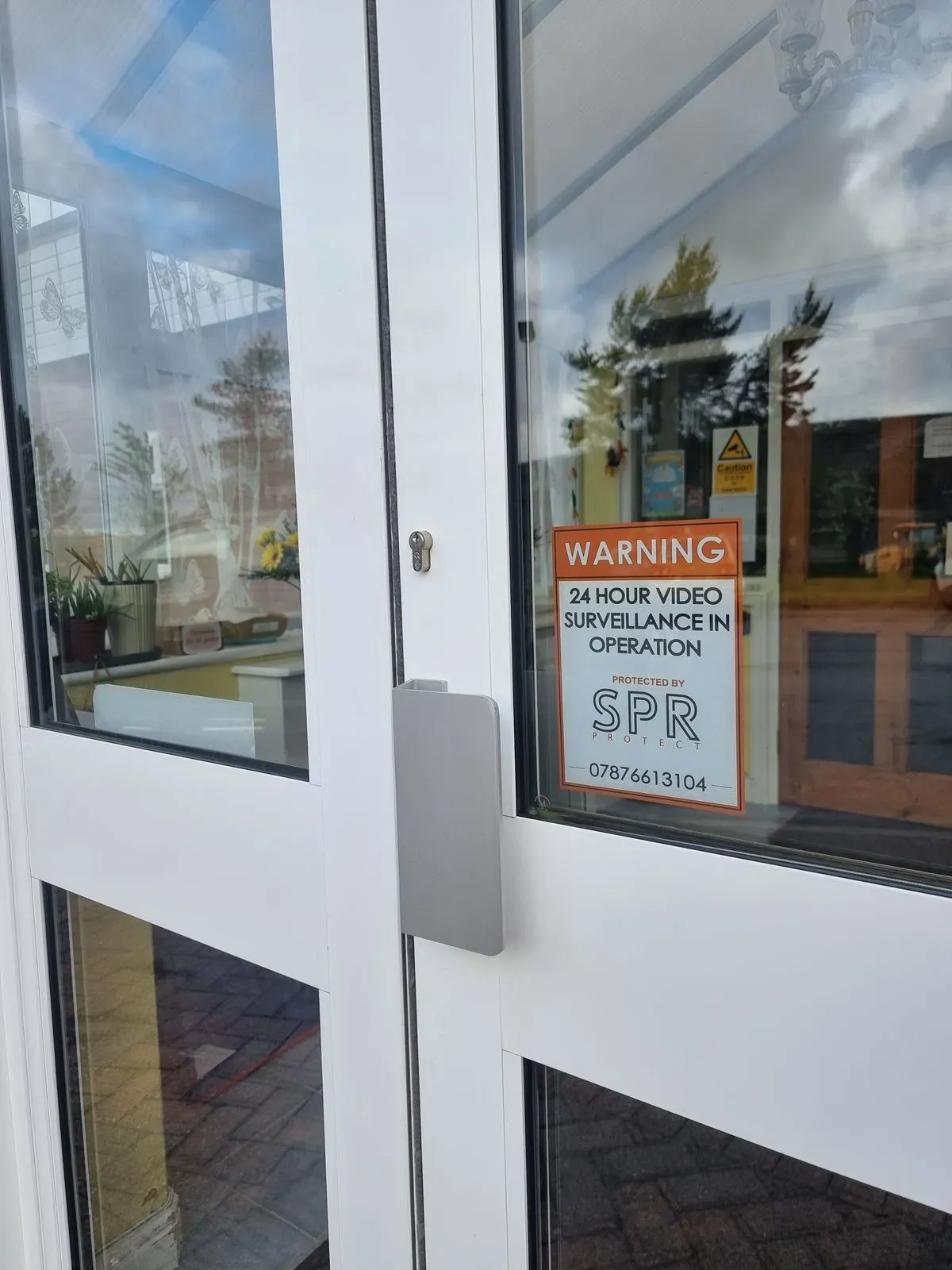 Window sticker CCTV warning on entrance