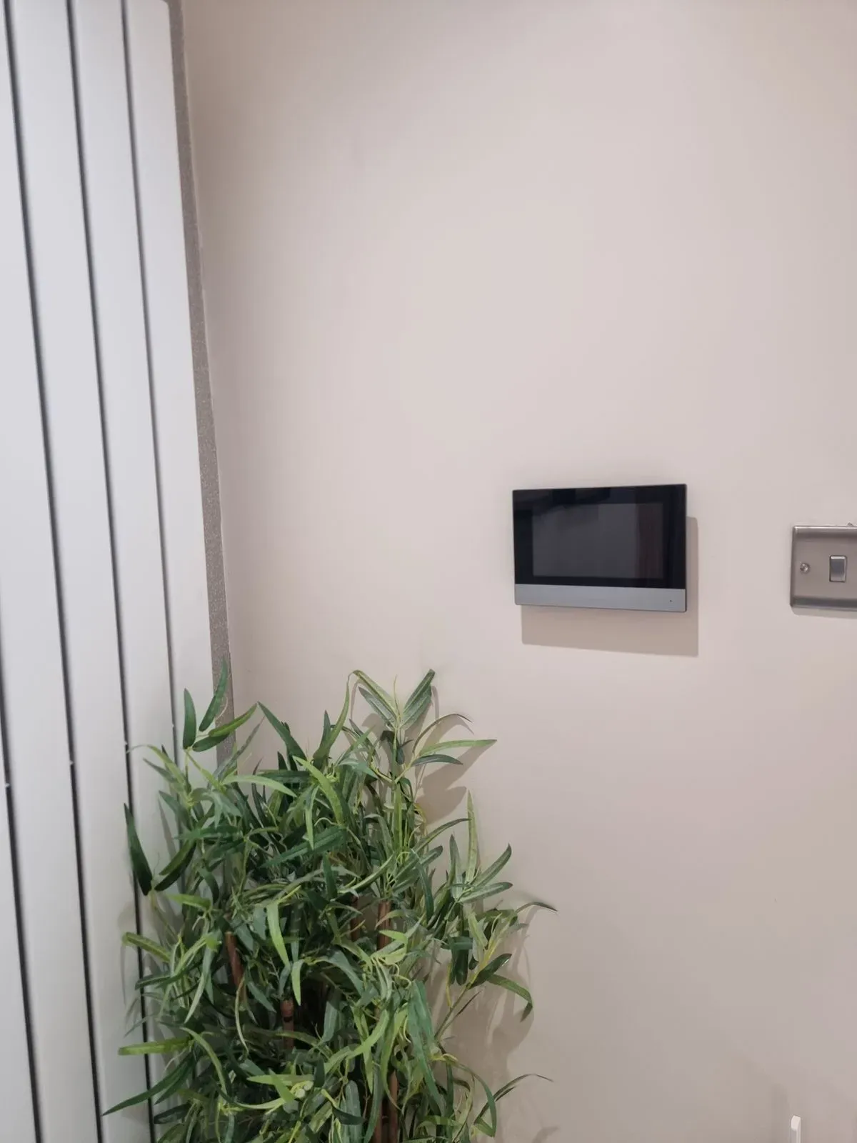Indoor screen for viewing intercom, installed seemlessly