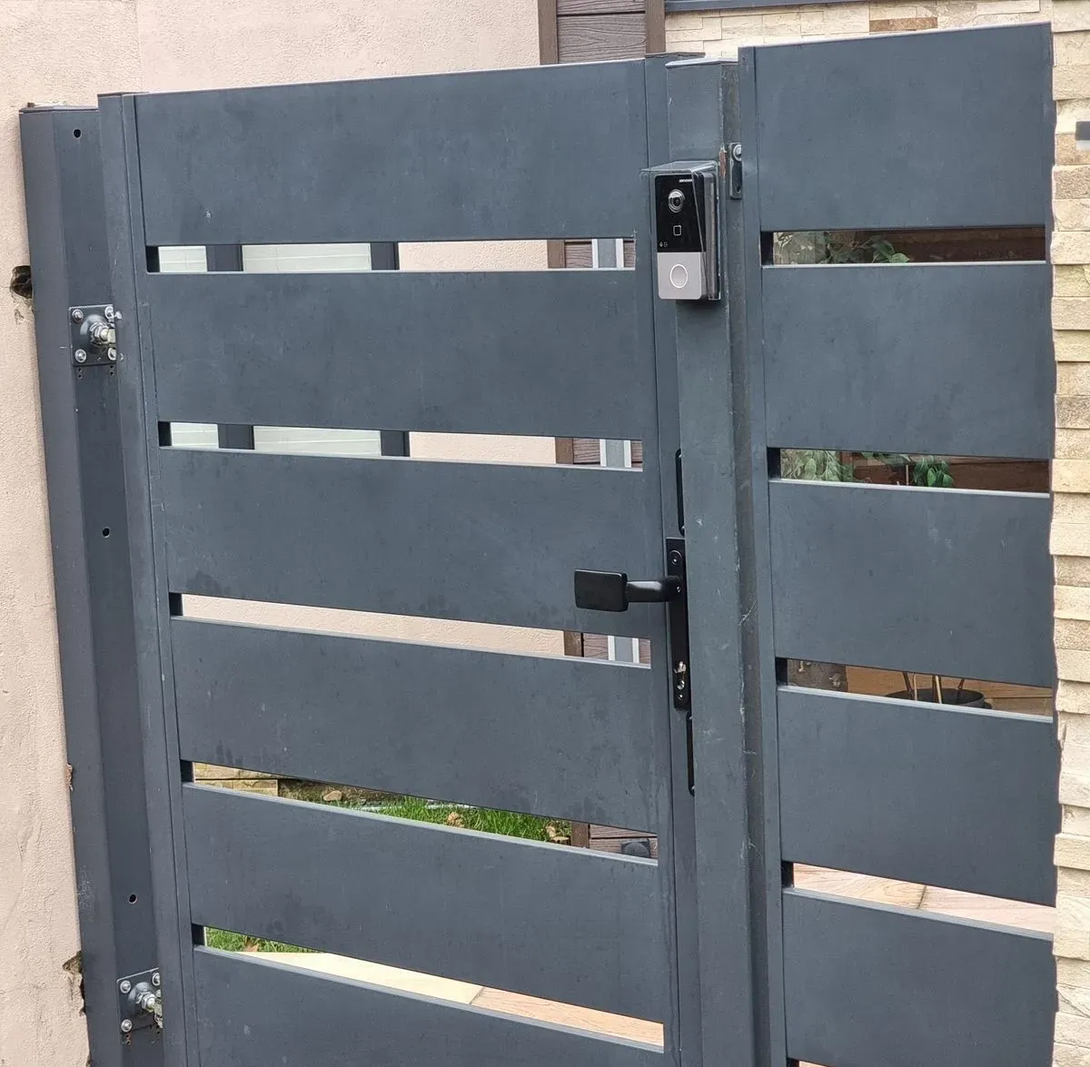 Electronic lock & intercom on front gate