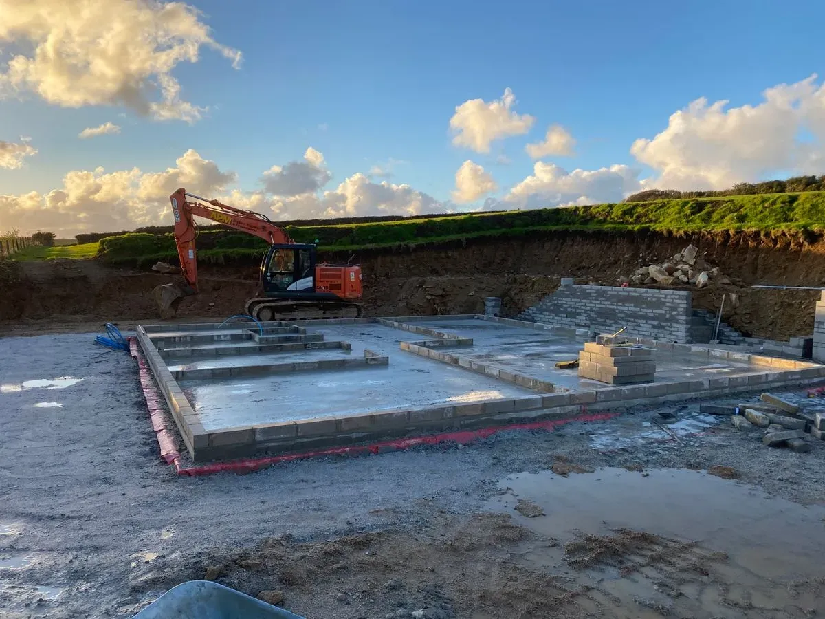 Builder communicating with clients in Devoran