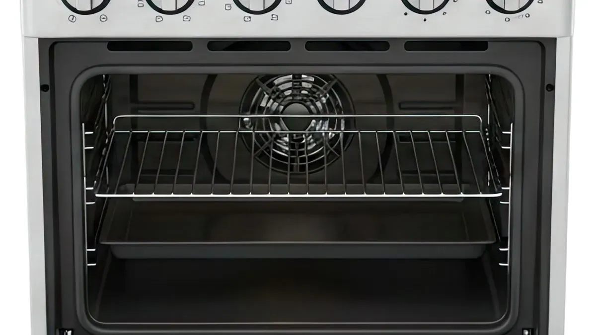 Technician repairing a range cooker at a Chafford Hundred home
