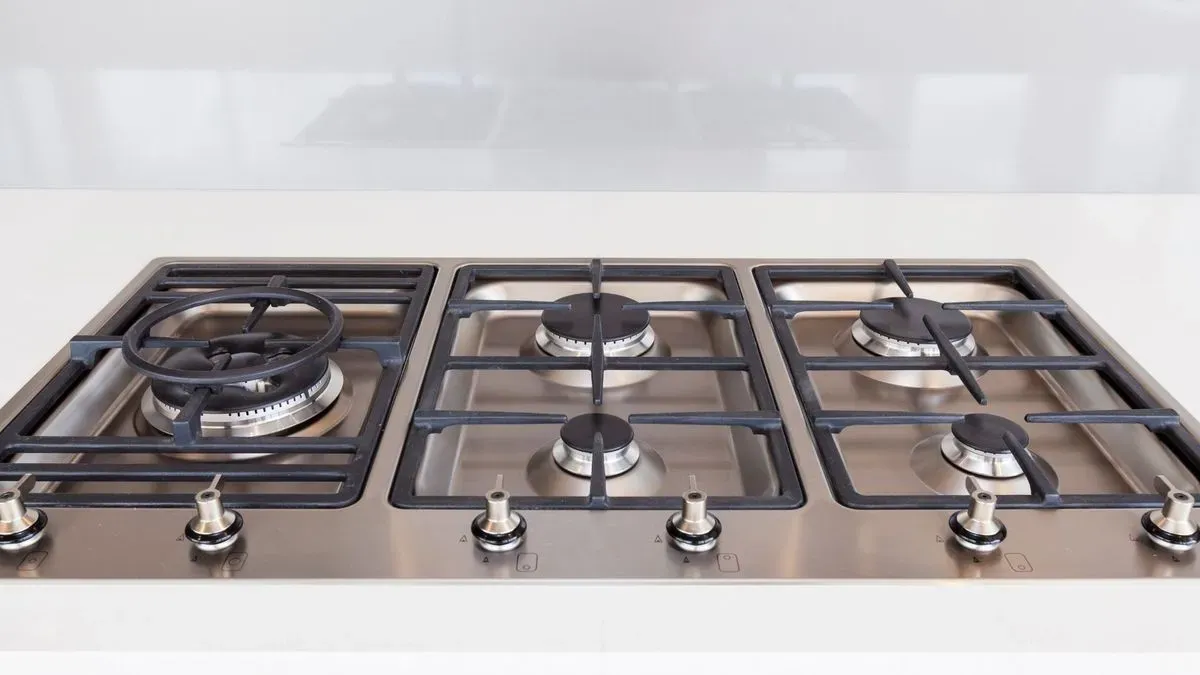 Close-up of a faulty gas burner on a range cooker in Essex