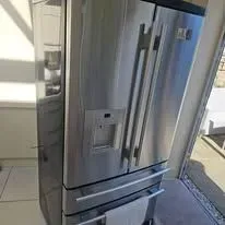 Expert technician diagnosing fridge freezer in Billericay