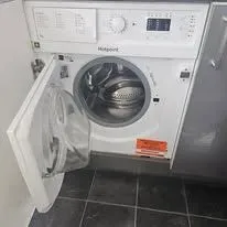 Professional team installing a tumble dryer in Stanford le Hope