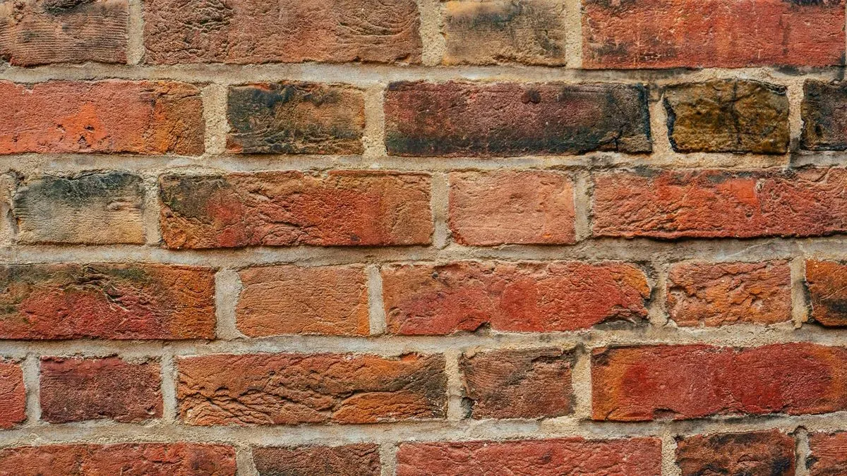Craftsman working on brick pointing in Washington