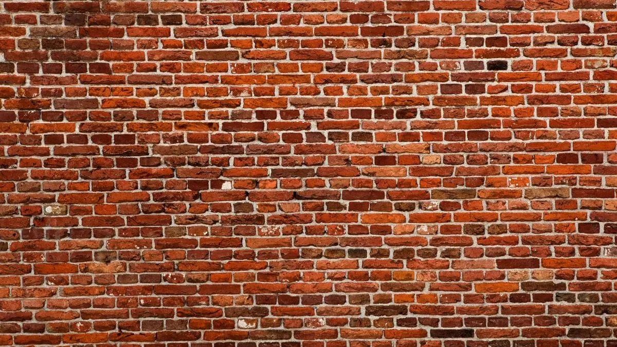 Brickpoint North East's specialists adjusting brick slips in Washington