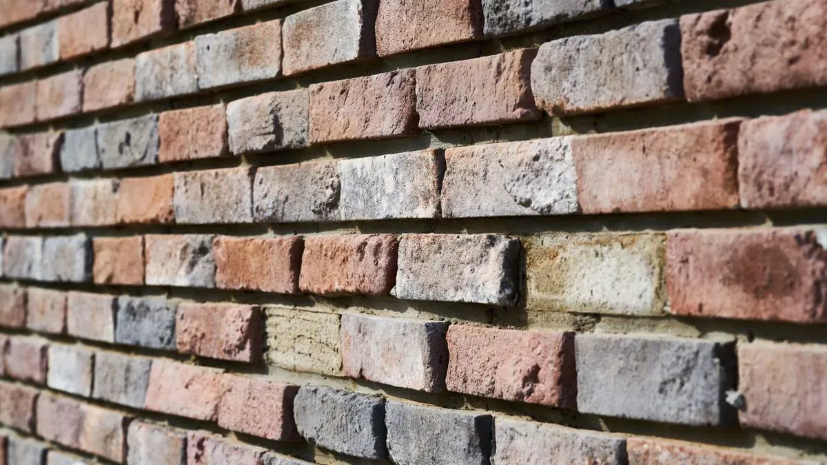 Before and after images of brick pointing in Washington