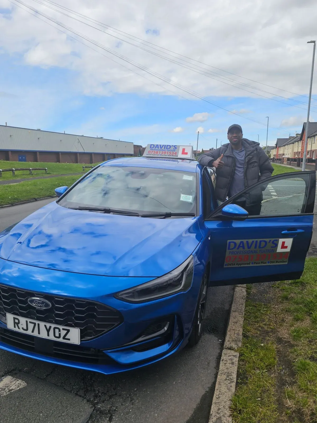 Driving Instructor giving feedback during a lesson in Anfield
