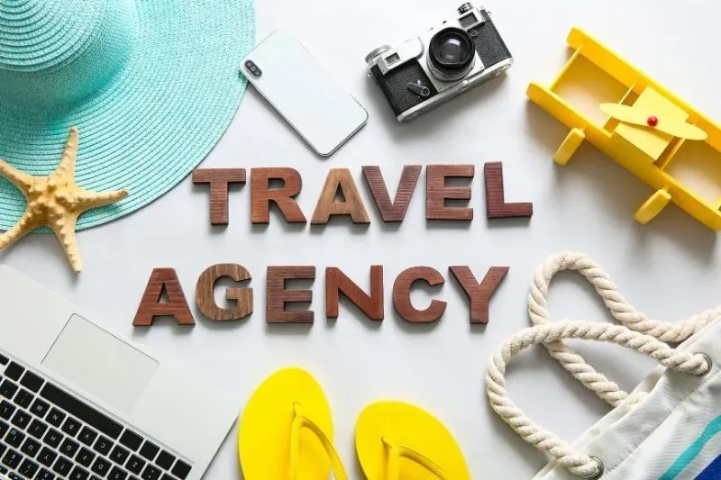 Happy traveller consulting with a holiday travel agent in Cheam