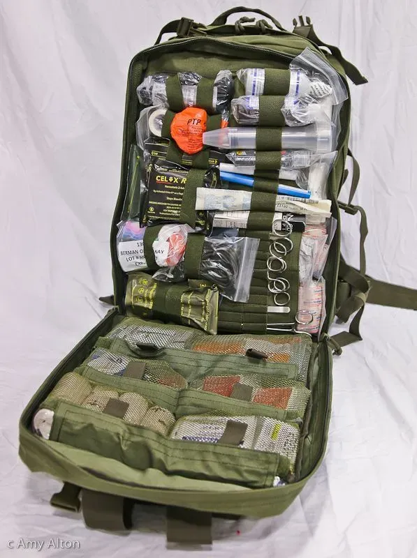 8222363250476-b9qo0wr77r02y957u46x1s-4770e190b2f9d3ec1df3860b0fcc00d1--survival-first-aid-kit-survival-bags collection background image