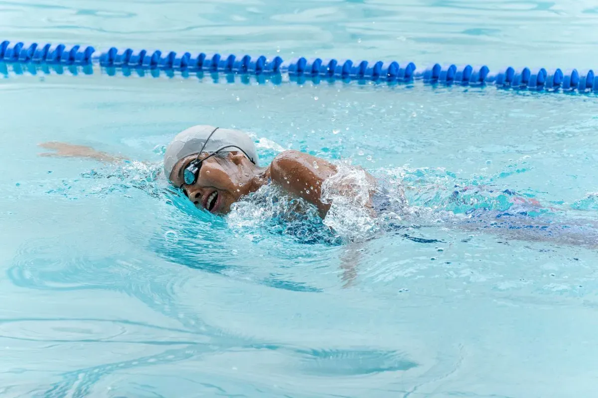 Children enjoying group swimming lessons in New Romley