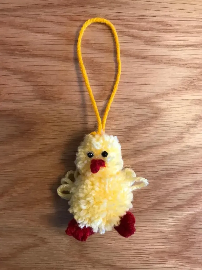 Easter - yellow- chicken- on- a -wooden-surface-image- thumbnail image