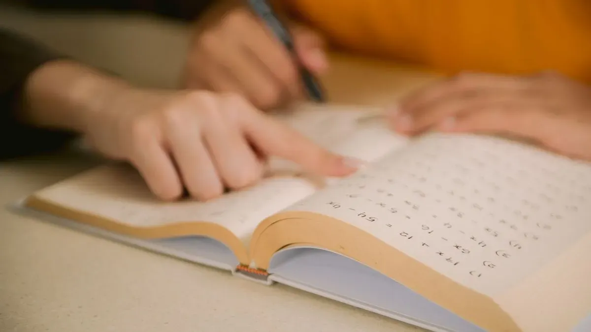 Student engaged in a maths tutoring session in New Malden