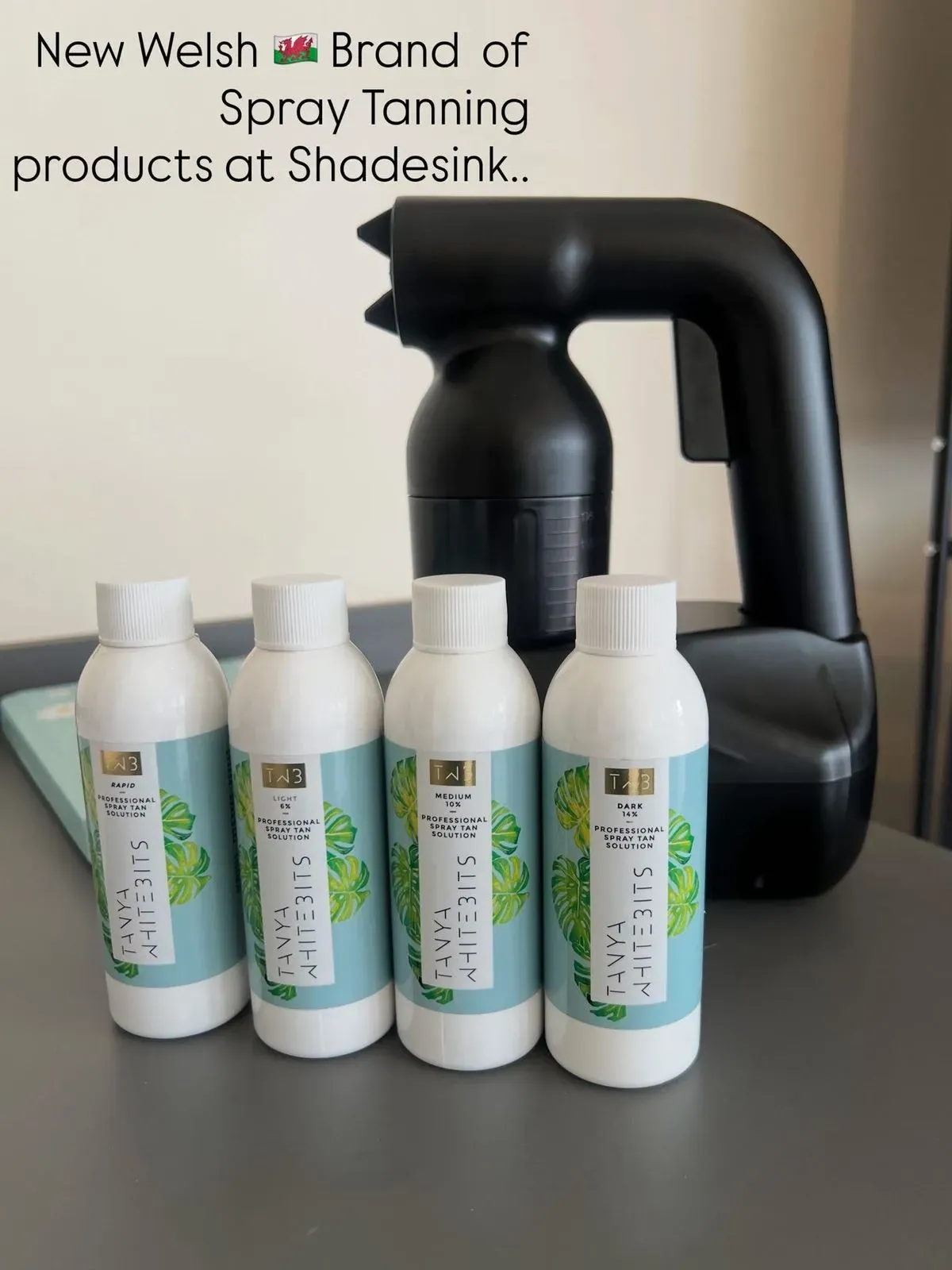 Professional spray tanning technician working at Shadesink in Prestatyn