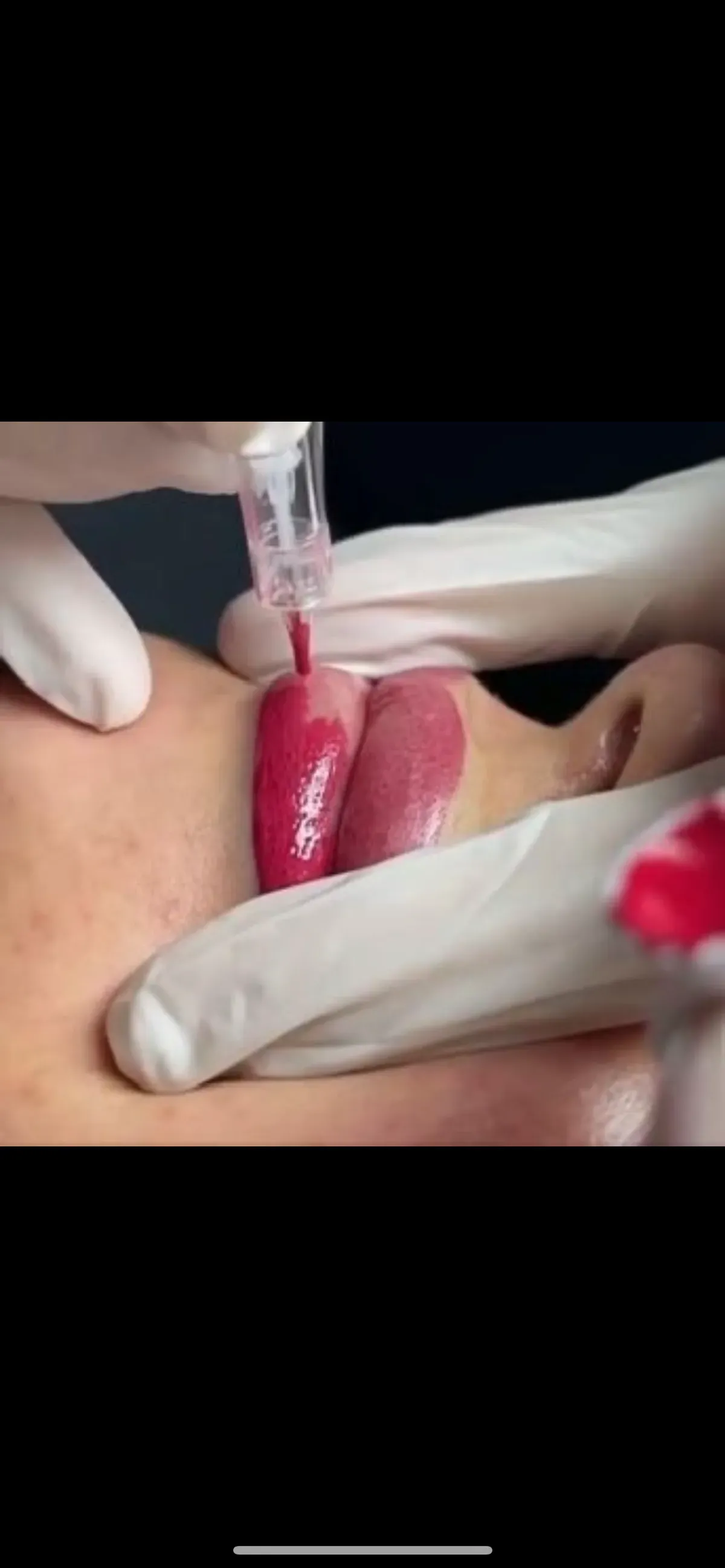 Technician showcasing semi-permanent makeup results at Shadesink