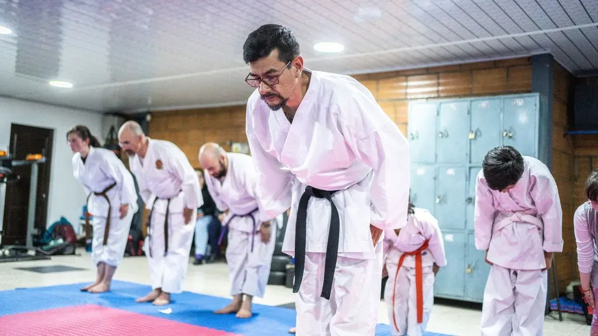 Adult karate practitioners in a training session