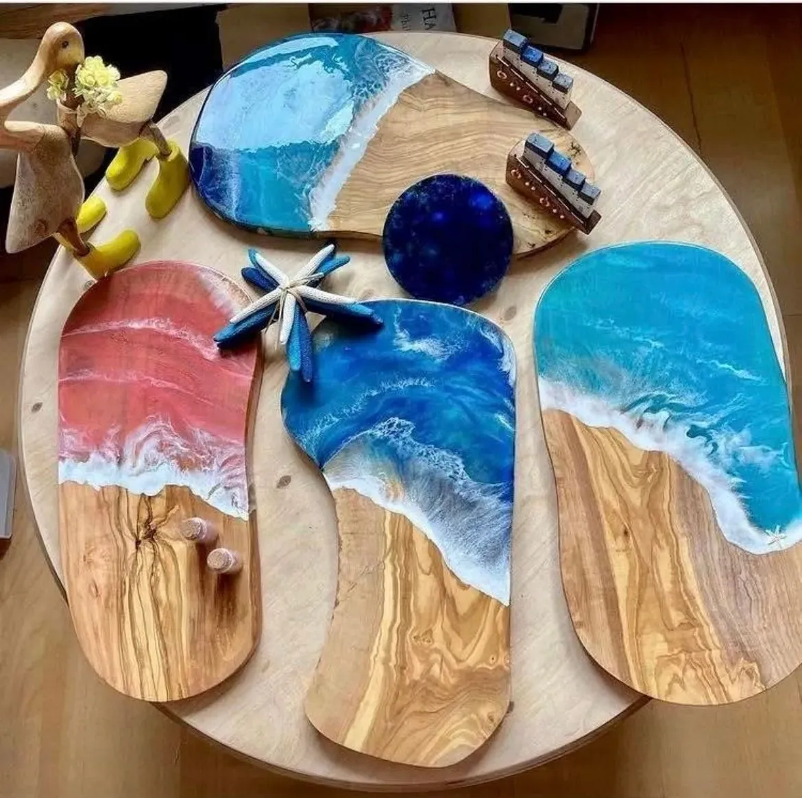 Anglesey beach and resin art  logo