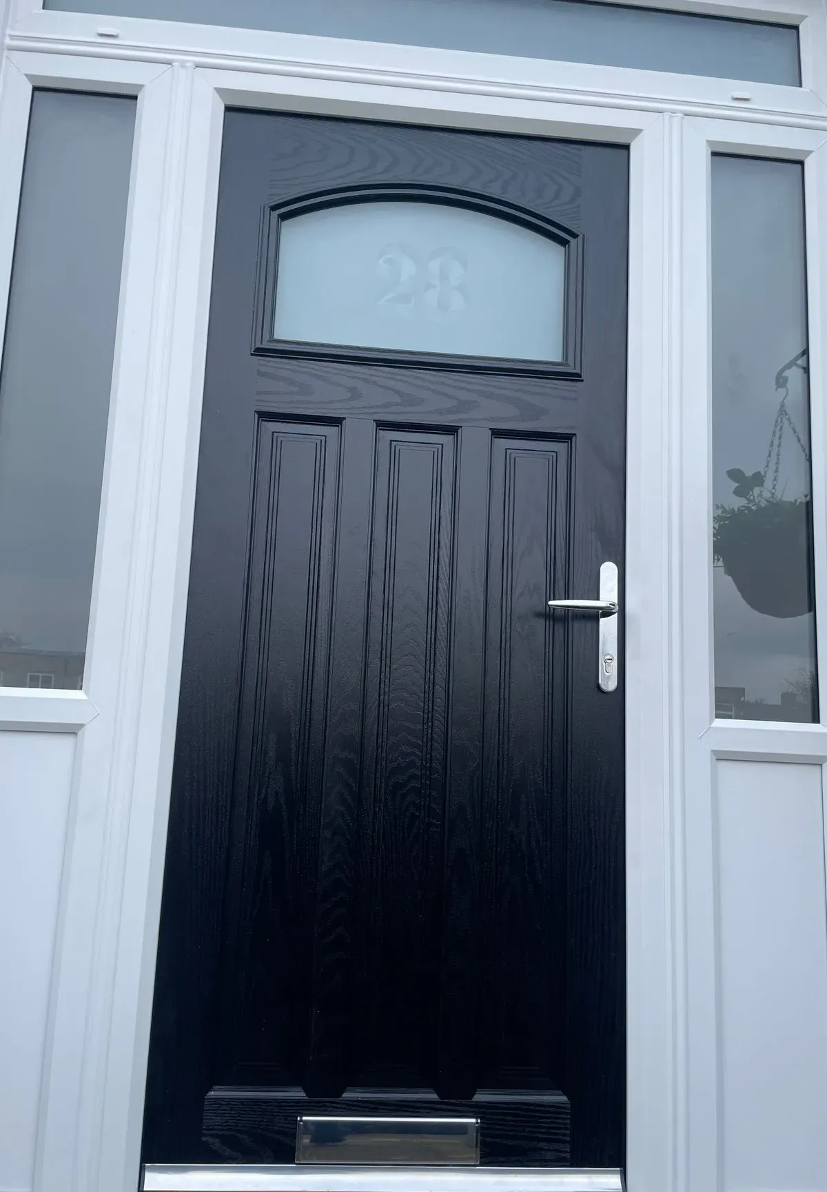 Finished front door installation enhancing local Fordham home