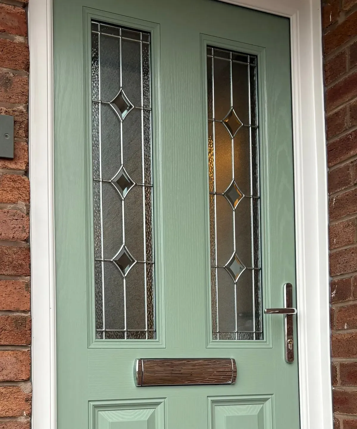 Woolton Doors team measuring for front door installation in Fordham