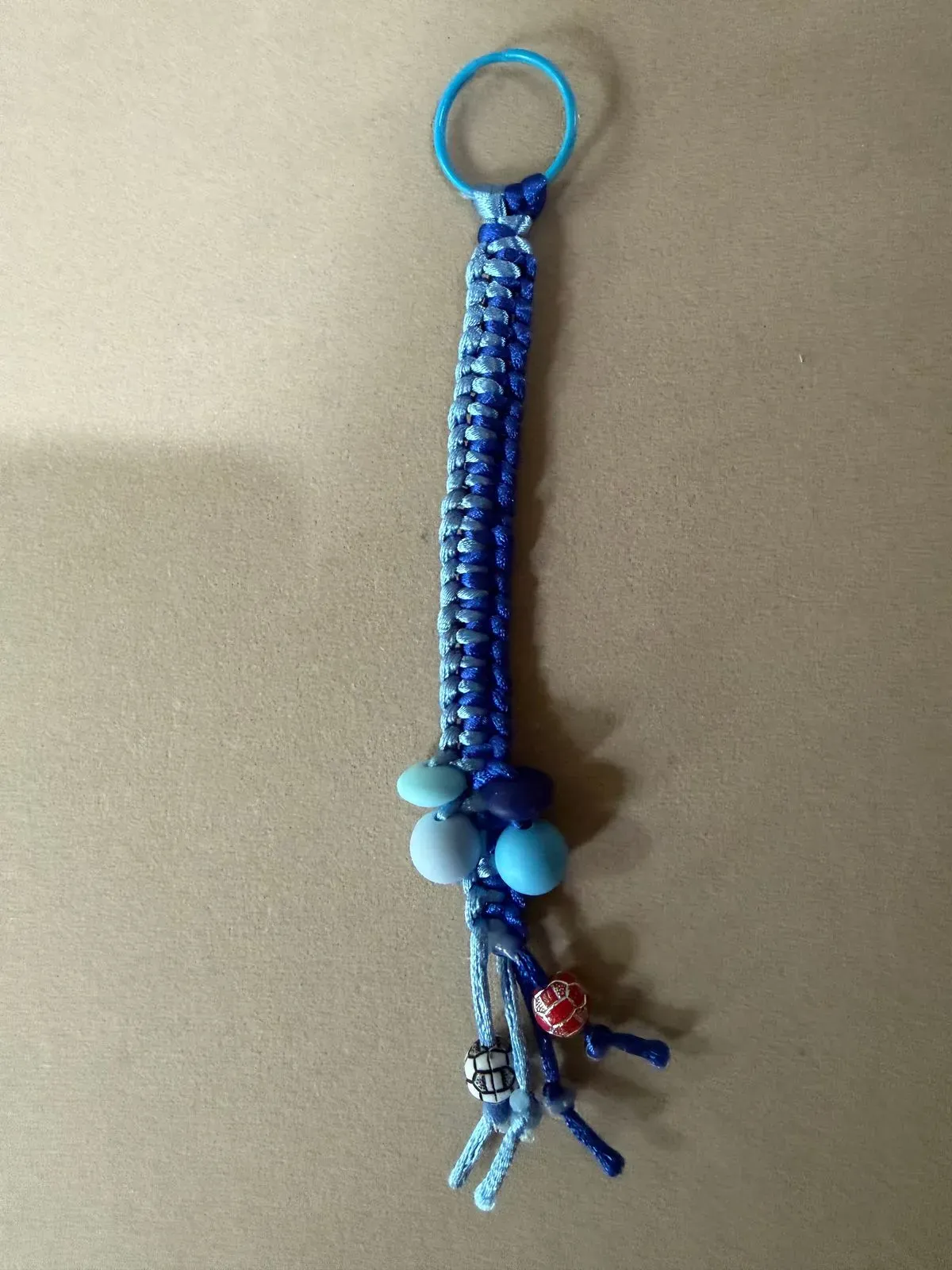 8219147730483-0k4mckkoaen1514jc8cqbe-Blue-Football-key-chain thumbnail image