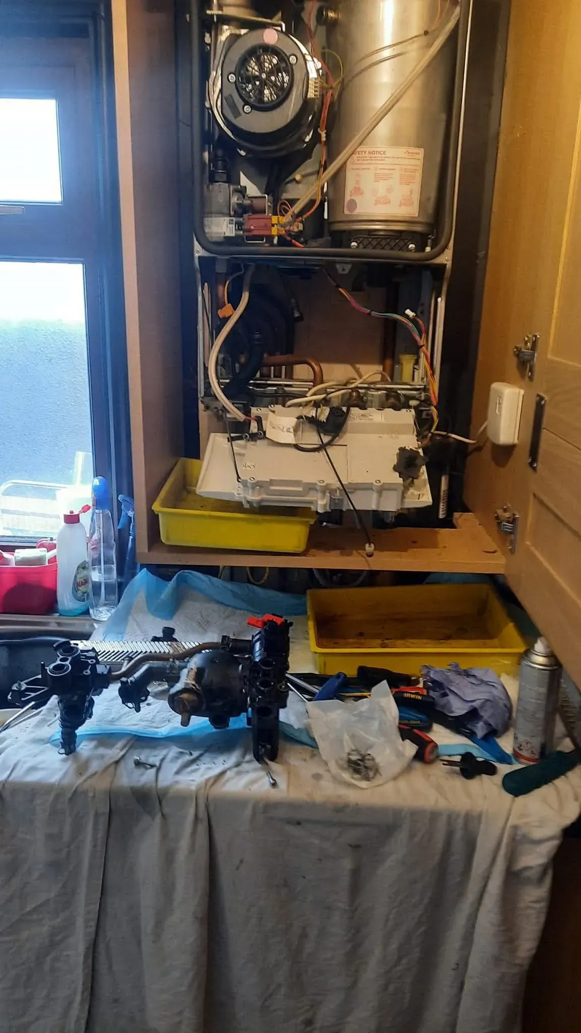 Technician diagnosing a boiler in Faringdon home