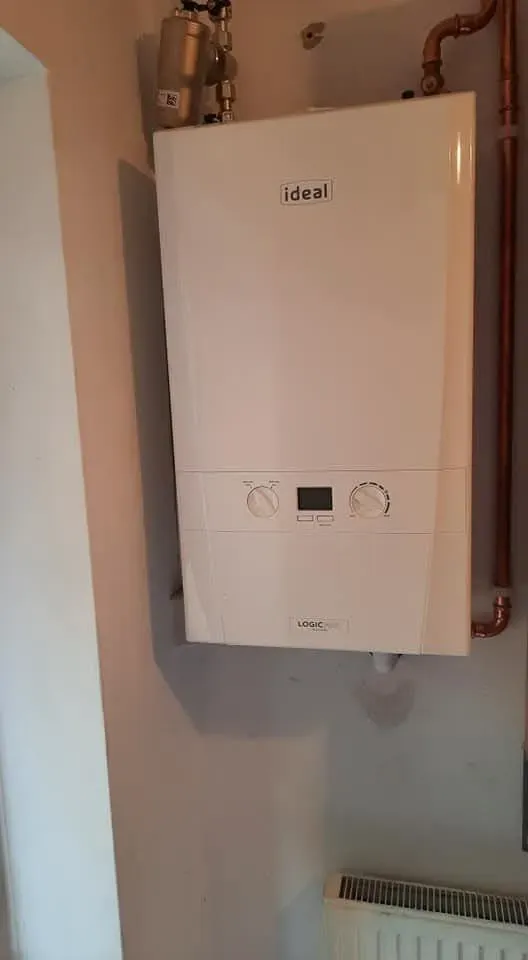 Team of plumbers working on boiler replacement in Faringdon